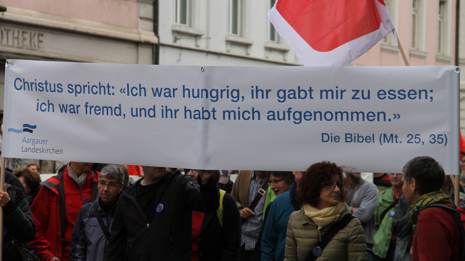 Transparent der Landeskirchen am "Aufstand für Anstand" in Aarau, 2015