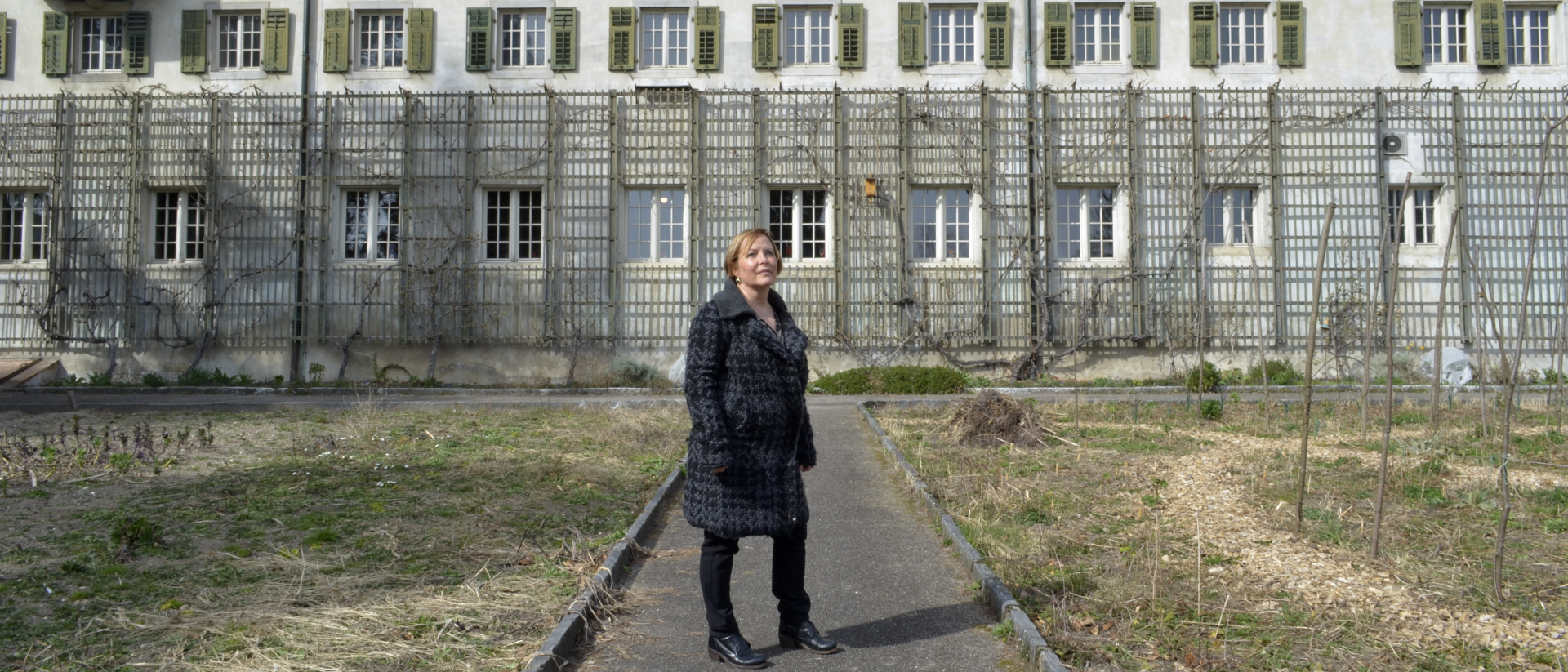 Claudia Fuhrer in front of the imposing former Capuchin monastery in Solothurn